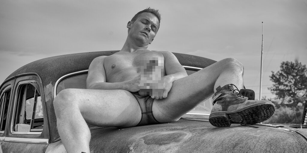Male physique-erotic photo created in an old junkyard.