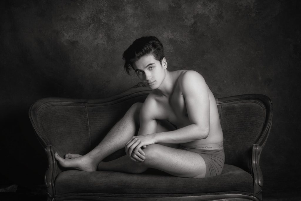 Fine art gay boudoir portrait Houston — black and white settee session by Trey Fox Photography