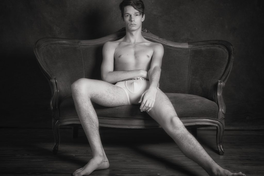 Fine art male boudoir portrait Houston — black and white settee session by Trey Fox Photography