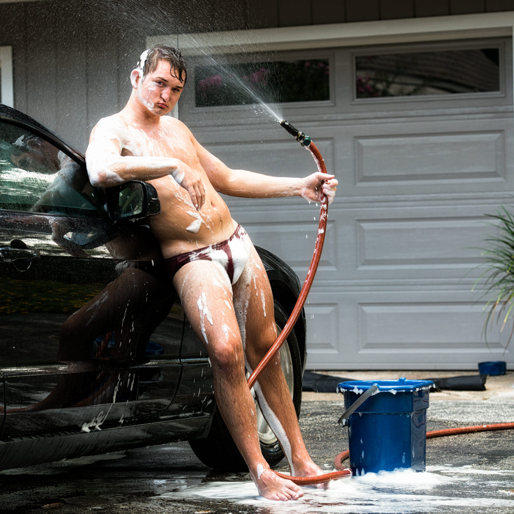 intimate male photography - "car wash" with a young, fit guy.